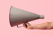© Natalie JEFFCOTT/Stocksy - Megaphone in hand