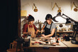 © Nunez Image/Stocksy - Coworkers in Artisan Workshop