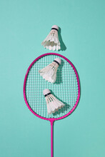 Badminton Racket With Feathered Shuttlecocks Pyramid.