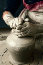 Ceramist, Man's Hands Working On Clay