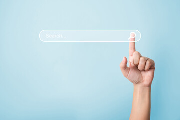 searching information data on internet networking concept. hand of man touching magnifying glass ico
