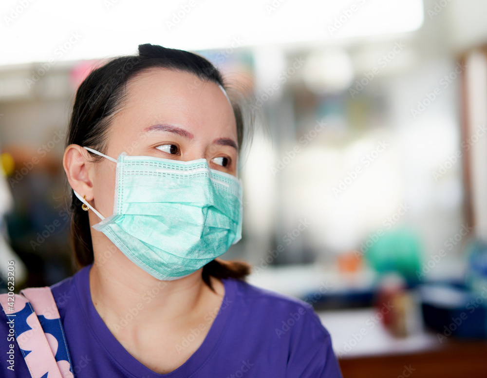 asia woman wear protect mask in covid 19 quarantine new normal