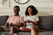 © ohlamour studio/Stocksy - Couple having fun gaming