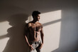 © Hernandez & Sorokina/Stocksy - Sexy Shirtless Man Wearing Jeans