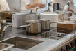 © Hernandez & Sorokina/Stocksy - Metallic Bowls In Professional Kitchen