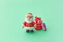 Handmade Plasticine Santa Claus With Bag Of Gift Boxes.