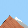 © Vaidas Bucys/Stocksy - Abstract minimalist architecture detail against blue sky