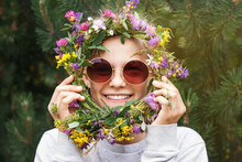 Happy Teenage Girl With Wildflower Wreath