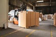 © Jelena Jojic Tomic/Stocksy - The worker transports freight using a forklift