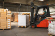 © Jelena Jojic Tomic/Stocksy - The worker transports freight using a forklift
