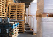 © Jelena Jojic Tomic/Stocksy - A small warehouse packed with a carload ready for distribution