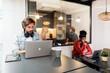 © Nunez Image/Stocksy - Office Workers in the Cafeteria