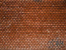 Texture Of Red Brick Wall In The City