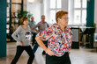 © VISUALSPECTRUM/Stocksy - Seniors Exercising With Social Distancing