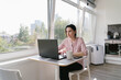 © Hernandez & Sorokina/Stocksy - Woman Working Using Laptop Indoors