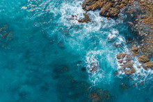 Aerial Views Over Crashing Sea Waves On Rocking Ocean Crop