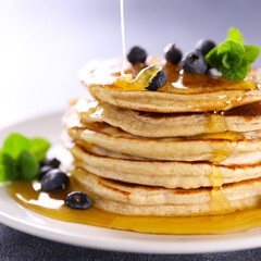 Wall Mural - stack of pancake with pouring syrup