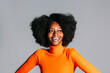 © MyMicrostock/Stocksy - Optimistic young black woman with curly hair