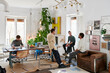 © Ivan Gener/Stocksy - Designers talking in their modern office