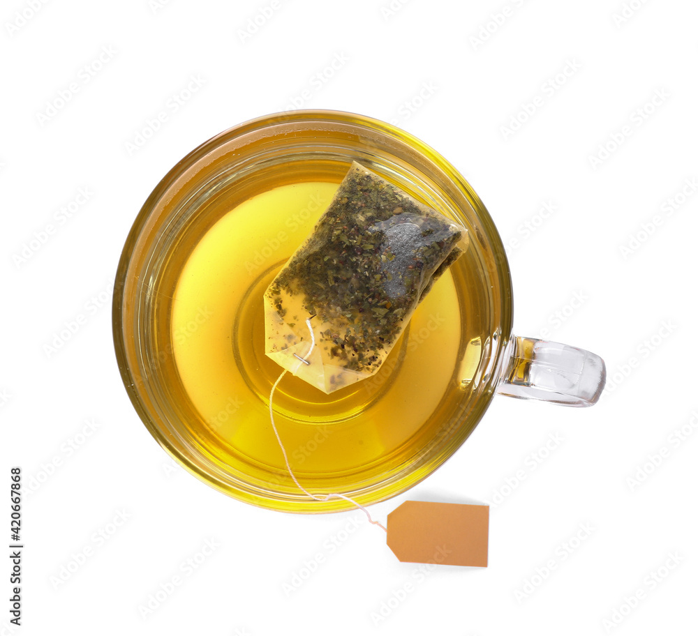 Cup of aromatic green tea on white background