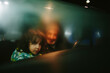 © Jimena Roquero/Stocksy - Kid and father inside a car with steamy windows