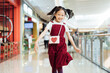 © MaaHoo Studio/Stocksy - Adorable girl in shopping center