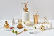 © Yaroslav Danylchenko/Stocksy - Modern set from golden cutlery and different things.