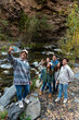 © Bisual Studio/Stocksy - Group of friends at autumn day make selfie photo