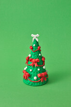Craft Figure Of Christmas Tree From Modeling Clay.