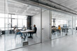 © Sergio Marcos/Stocksy - Two different multiethnic groups having a meeting in two glass cubicles of a modern coworking