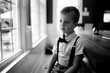 © Jakob Lagerstedt/Stocksy - Cute young boy wearing suspenders and a bowtie