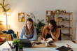© Boris Jovanovic/Stocksy - Women working at home