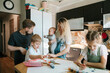 © Irina Polonina/Stocksy - Happy big family at home.
