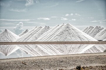 Wall Mural - Salt Pyramids in Bonaire, caribbean island, dutch antilles. Salt mountains, Salt mountain range. Salt towers