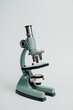 © Vera Lair/Stocksy - Small Microscope On A white background
