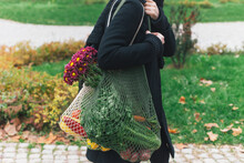 Woman Holding Mesh Bags