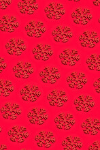 Snowflake Pattern On Red Background