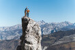 © Manu Prats/Stocksy - Climbers friends taking selfie on top of pinnacle