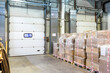 © Roman - General view to the loading gates in the big distribution warehouse inside