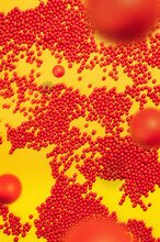 Bunch Of Red Round Shapes-balls On Yellow Background.