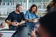 © Jacob Lund - Businessman in meeting with team