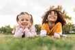 © Nunez Image/Stocksy - Funny Afro Little Girl and Friend