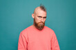 © Анастасия Каргаполов - Bearded european man in casual peach isolated on turquoise background with gloomy expression needs support and help