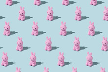 Easter Pattern Made With Easter Bunny On Blue Background. Creative Minimal Holiday Concept. Flat Lay, Top View