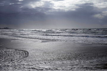 Wall Mural - Stormy weather along the coast of Scheveningen