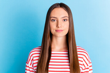 Wall Mural - Photo of adorable shiny young girl wear striped shirt smiling isolated blue color background