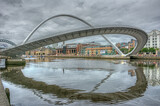 Gateshead Millennium Bridge which connects Gateshead and Newcastle upon Tyne and spans the River Tyne in north east England