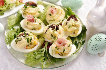 Wall Mural - eggs with mayonnaise stuffed with vegetable salad on Easter table