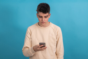 Poster - teenager boy or student with mobile phone isolated on background