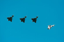 German Eurofighter Typhoon Fighter Planes Taking Part In NATO Exercise Frysian Flag, Low Angle Against Blue Sky, Netherlands